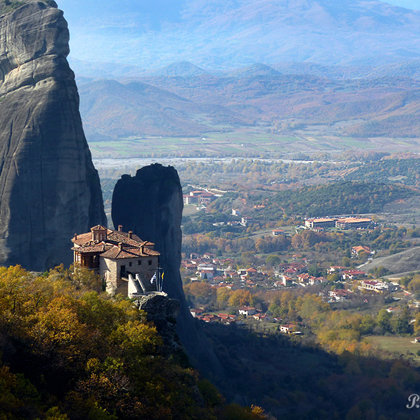 Monastery at Meteora with a view of the village Kastraki, Greece