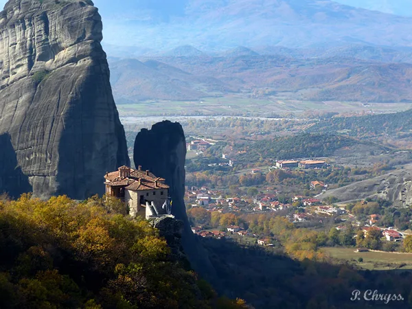 Monastery at Meteora with a view of the village Kastraki, Greece