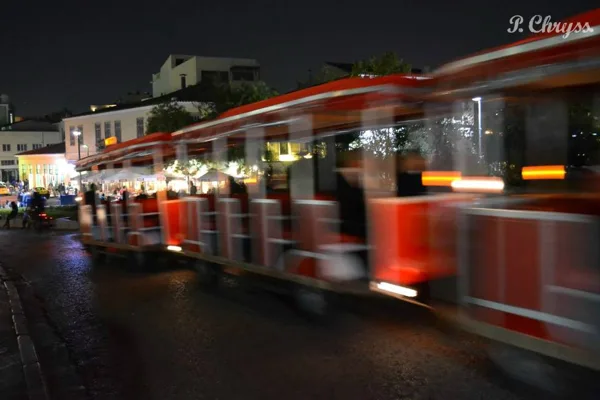 Happy train in the streets of Plaka, the old town of Athens, Greece